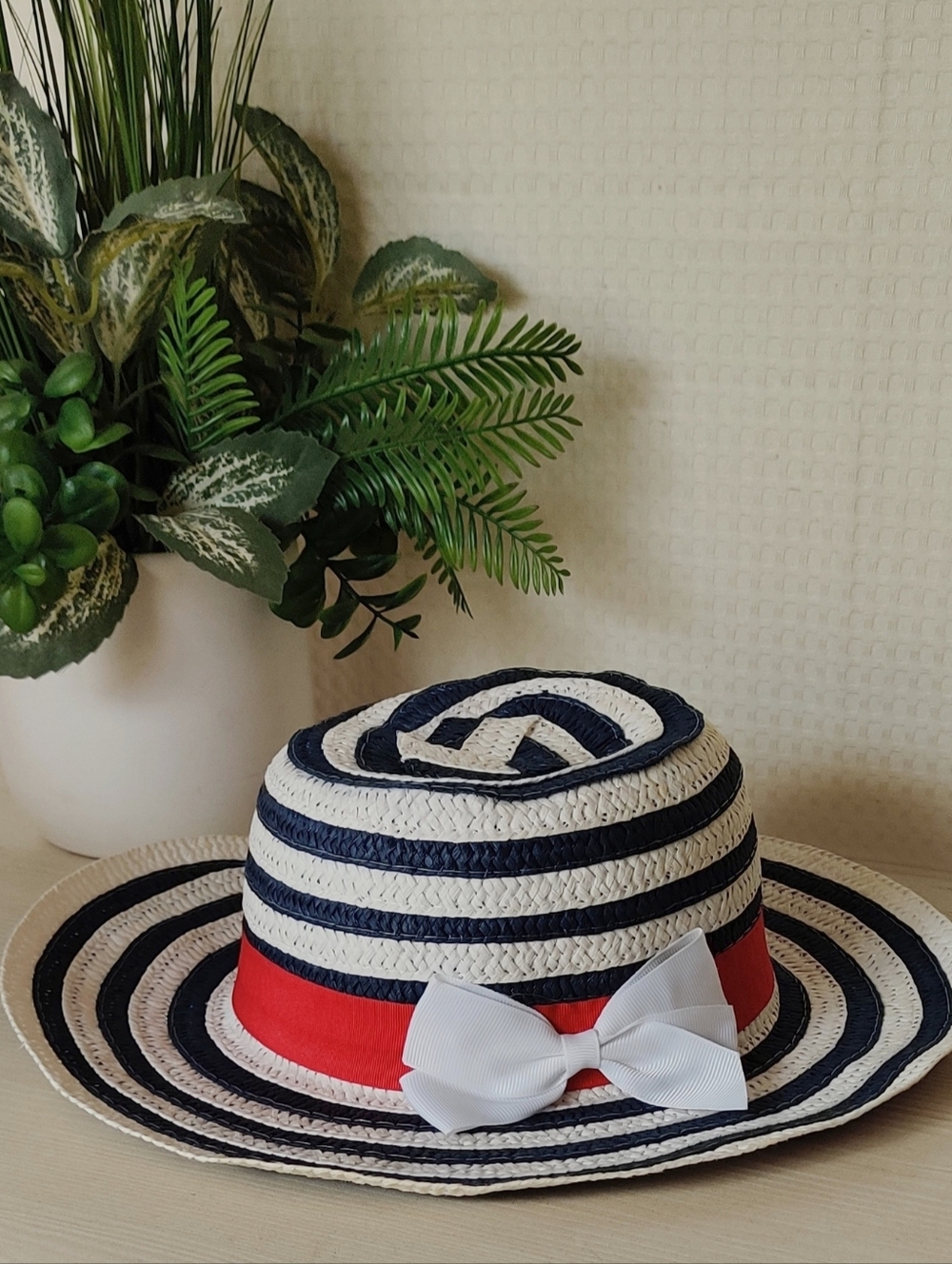Blue And White Striped Wide-Brim Straw Hat with Red Band and White Bow